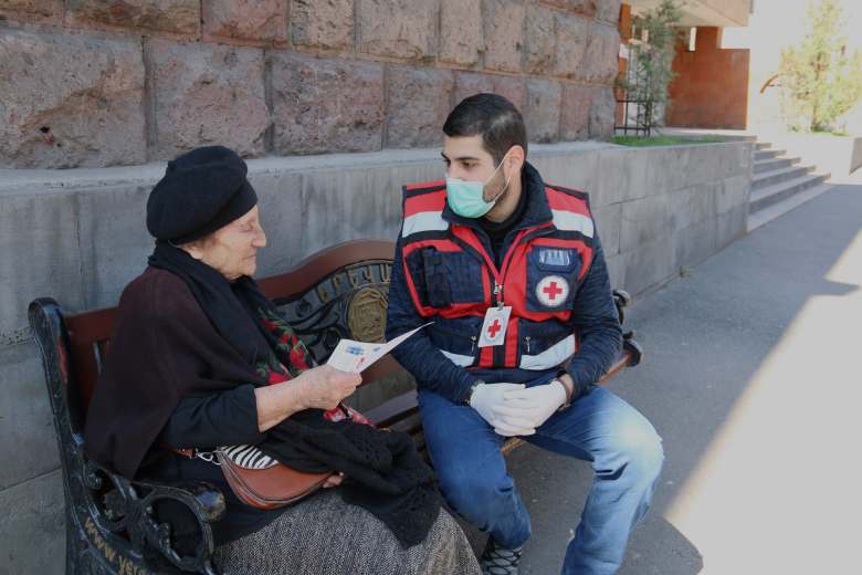 Volunteers distribute informative materials about Coronavirus in public places